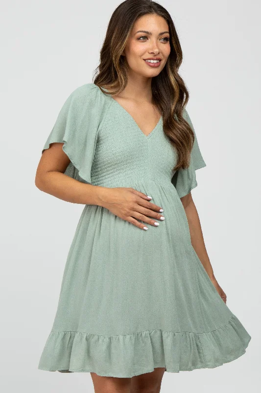 mint-green-smocked-front-ruffle-hem-maternity-dress