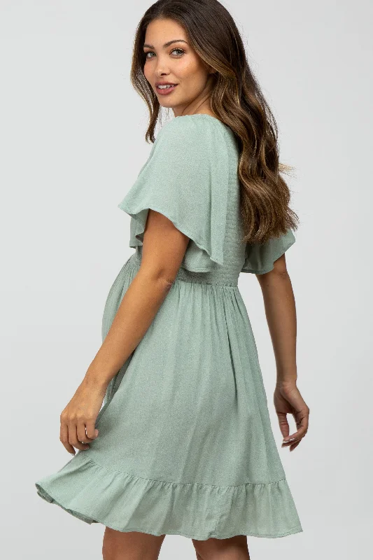 mint-green-smocked-front-ruffle-hem-maternity-dress