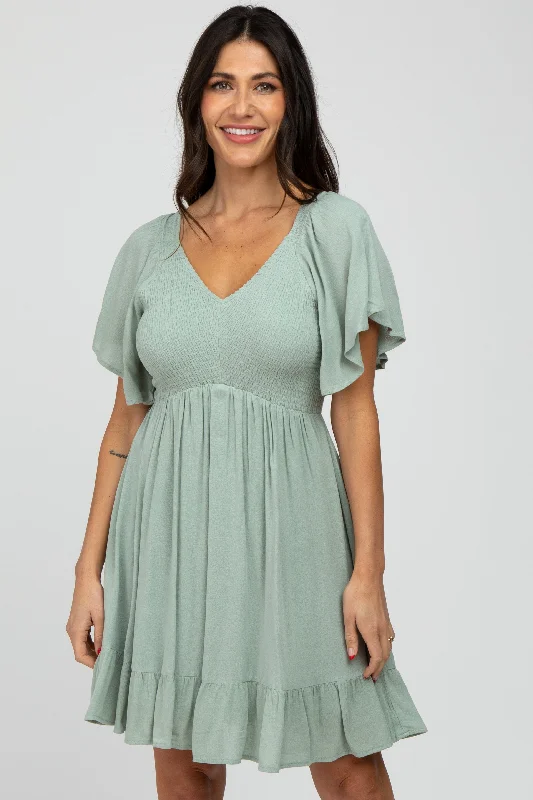 mint-green-smocked-front-ruffle-hem-maternity-dress