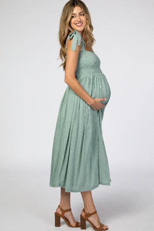 mint-green-smocked-tie-strap-maternity-midi-dress