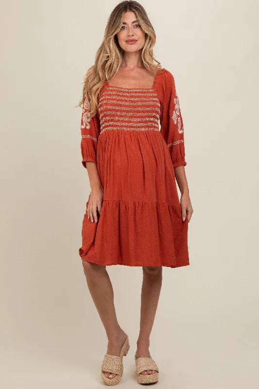 rust-smocked-embroidered-damask-maternity-dress