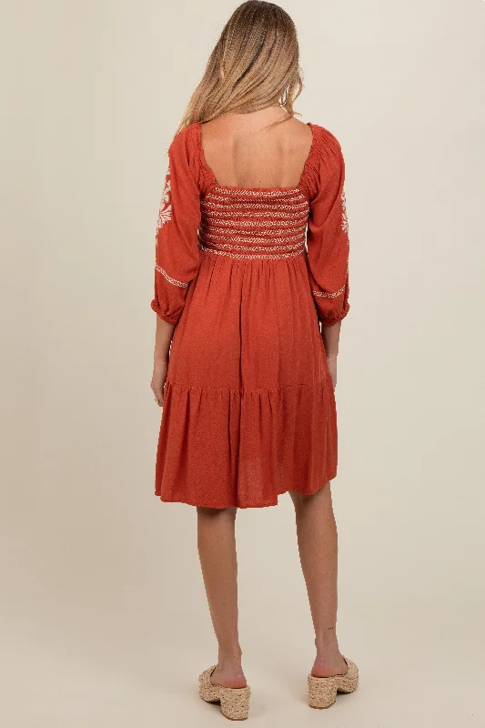 rust-smocked-embroidered-damask-maternity-dress