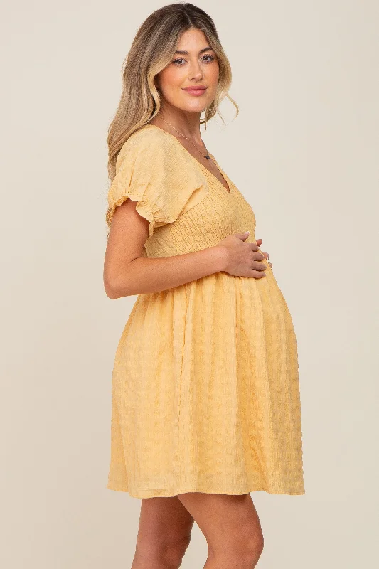 yellow-smocked-textured-v-neck-maternity-dress