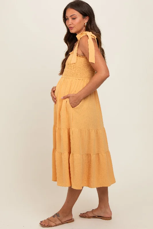 yellow-smocked-tie-strap-tiered-maternity-midi-dress