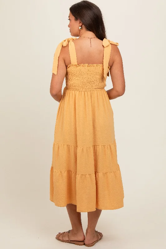 yellow-smocked-tie-strap-tiered-maternity-midi-dress